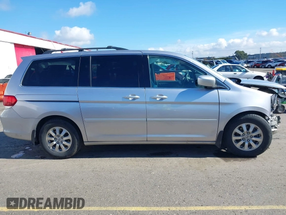 2010 Honda Odyssey EX-L with VIN 5FNRL3H78AB006181, listed as a IAAI auction lot 38906387 with 171,426 mi miles and . Bid and sale history available at DreamBid. Image 14.