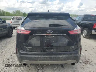 2020 Ford Edge SEL z VIN 2FMPK4J95LBB04706, wystawiony jako Copart lot #56948215 z przebiegiem 69 376 mil mil oraz Czysty tytuł • Clean title. Historia ofert i sprzedaży dostępna na DreamBid. Obrazek 6.