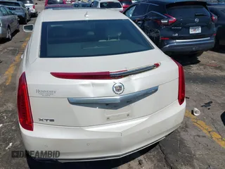 2014 Cadillac XTS Luxury with VIN 2G61M5S32E9310910, listed as a IAAI auction lot 41978298 with Not provided miles and . Bid and sale history available at DreamBid. Image 16.