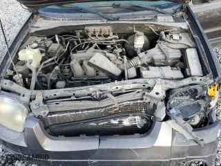 2006 Ford Escape XLT with VIN 1FMYU03186KB35165, listed as a Copart auction lot 71563254 with 206,450 mi miles and Clean Title. Bid and sale history available at carsss.com. Image 12.