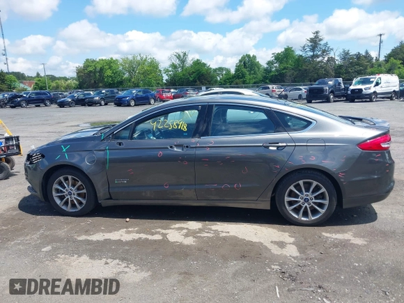 2017 Ford Fusion Titanium z VIN 3FA6P0SUXHR184919, wystawiony jako IAAI lot #42258918 z przebiegiem Nie podano mil oraz . Historia ofert i sprzedaży dostępna na DreamBid. Obrazek 15.