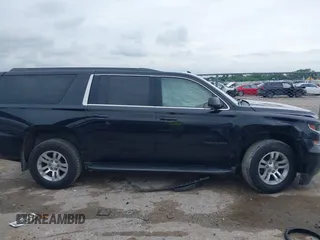 2020 Chevrolet Suburban LT with VIN 1GNSKHKC9LR103062, listed as a IAAI auction lot 42478008 with 229,786 mi miles and . Bid and sale history available at DreamBid. Image 13.
