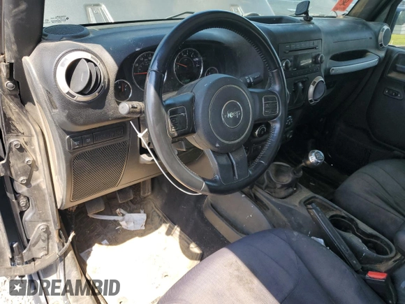 2017 Jeep Wrangler Rubicon with VIN 1C4BJWCG0HL675472, listed as a Copart auction lot 62751365 with 86,338 mi miles and Salvage title. Bid and sale history available at DreamBid. Image 8.