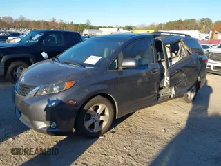 2011 Toyota Sienna LE AAS with VIN 5TDKK3DC2BS070656, listed as a IAAI auction lot 41034261 with 259,239 mi miles. Bid and sale history available at carsss.com. Image 17.