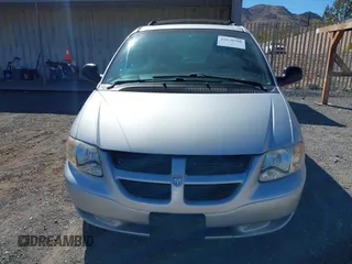 2002 Dodge Grand Caravan with VIN 1B8GP34362B607166, listed as a IAAI auction lot 41670588 with 179,879 mi miles and . Bid and sale history available at DreamBid. Image 6.