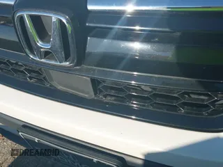 2020 Honda CR-V LX z VIN 5J6RW1H2XLA017897, wystawiony jako IAAI lot #42657636 z przebiegiem 82 956 mil mil oraz . Historia ofert i sprzedaży dostępna na DreamBid. Obrazek 22.