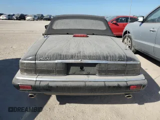1995 Jaguar XJS with VIN SAJNX2748SC198836, listed as a Copart auction lot 75833334 with 145,794 mi miles and Salvage Title. Bid and sale history available at carsss.com. Image 6.