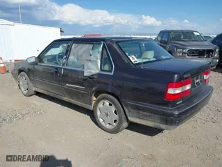 1997 Volvo S90 with VIN YV1KS960XV1115179, listed as a IAAI auction lot 40556853 with 115,660 mi miles. Bid and sale history available at carsss.com. Image 3.