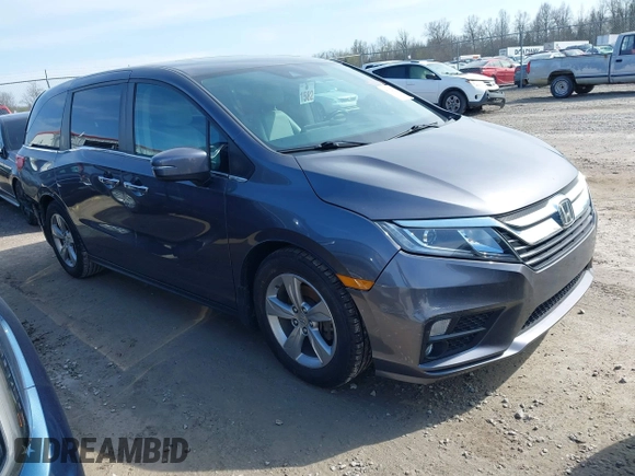 2018 Honda Odyssey EX-L with VIN 5FNRL6H77JB101803, listed as a IAAI auction lot 41927622 with 147,587 mi miles. Bid and sale history available at carsss.com. Image 1.