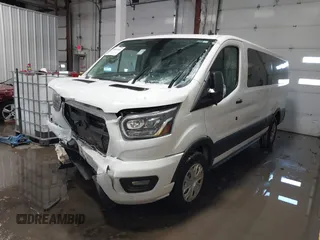 2023 Ford Transit Passenger XL with VIN 1FBAX2YGXPKA45186, listed as a IAAI auction lot 41625035 with 42,174 mi miles and . Bid and sale history available at DreamBid. Image 2.
