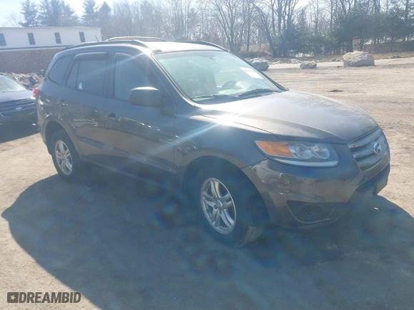 2012 Hyundai Santa Fe GLS with VIN 5XYZGDAB5CG126900, listed as a IAAI auction lot 41781584 with 124,897 mi miles. Bid and sale history available at carsss.com. Image 1.