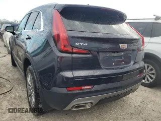 2022 Cadillac XT4 FWD Premium Luxury z VIN 1GYFZCR44NF166169, wystawiony jako Copart lot #77981414 z przebiegiem 9 734 mil mil oraz Nie do naprawy • Non repairable. Historia ofert i sprzedaży dostępna na DreamBid. Obrazek 6.