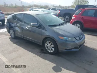 2010 Honda Insight EX with VIN JHMZE2H71AS032532, listed as a IAAI auction lot 41988221 with 333,144 mi miles and . Bid and sale history available at carsss.com. Image 1.