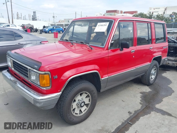 1991 Isuzu Trooper z VIN JACCH58R0M7904092, wystawiony jako IAAI lot #41900283 z przebiegiem 226 780 mil mil oraz . Historia ofert i sprzedaży dostępna na DreamBid. Obrazek 2.