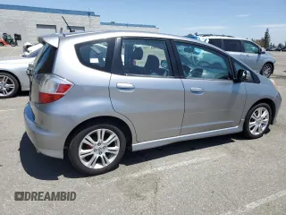 2010 Honda Fit Sport with VIN JHMGE8H69AS025801, listed as a Copart auction lot 58416375 with 216,216 mi miles and Clean title. Bid and sale history available at DreamBid. Image 3.