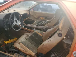 1978 Porsche 928 z VIN 9288102456, wystawiony jako Copart lot #85813494 z przebiegiem 105 147 mil mil oraz Szkody całkowita. Historia ofert i sprzedaży dostępna na DreamBid. Obrazek 7.