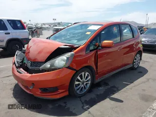 2012 Honda Fit Sport z VIN JHMGE8H57CC042178, wystawiony jako IAAI lot #42353989 z przebiegiem 115 911 mil mil oraz . Historia ofert i sprzedaży dostępna na DreamBid. Obrazek 2.