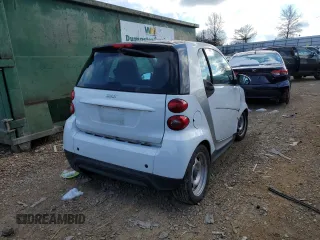 2015 Smart fortwo Passion z VIN WMEEJ3BA8FK790317, wystawiony jako Copart lot #71124392 z przebiegiem Nie podano mil oraz Szkody całkowita. Historia ofert i sprzedaży dostępna na DreamBid. Obrazek 3.