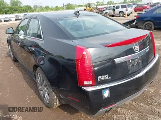 2012 Cadillac CTS Luxury z VIN 1G6DG5E57C0131349, wystawiony jako IAAI lot #42272340 z przebiegiem 61 879 mil mil oraz . Historia ofert i sprzedaży dostępna na DreamBid. Obrazek 3.