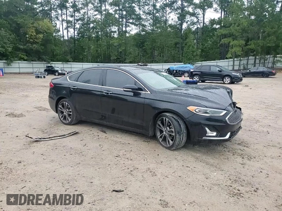 2019 Ford Fusion Titanium with VIN 3FA6P0K9XKR217324, listed as a Copart auction lot 56104185 with 135,728 mi miles and Salvage title. Bid and sale history available at DreamBid. Image 11.
