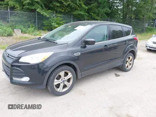 2013 Ford Escape SE with VIN 1FMCU9G91DUA07169, listed as a IAAI auction lot 42602370 with 153,001 mi miles and . Bid and sale history available at DreamBid. Image 2.