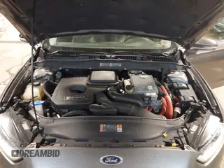 2013 Ford Fusion Titanium Hybrid with VIN 3FA6P0RU6DR319586, listed as a IAAI auction lot 42138979 with 125,388 mi miles. Bid and sale history available at carsss.com. Image 10.