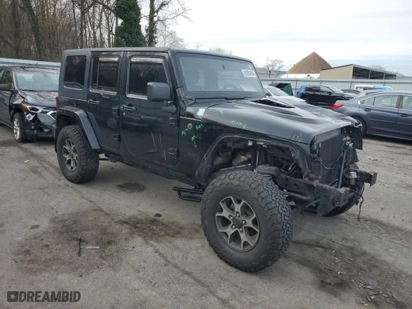 2012 Jeep Wrangler Unlimited Sport with VIN 1C4HJWDG4CL175882, listed as a Copart auction lot 81064854 with 205,964 mi miles and Salvage Title. Bid and sale history available at carsss.com. Image 4.