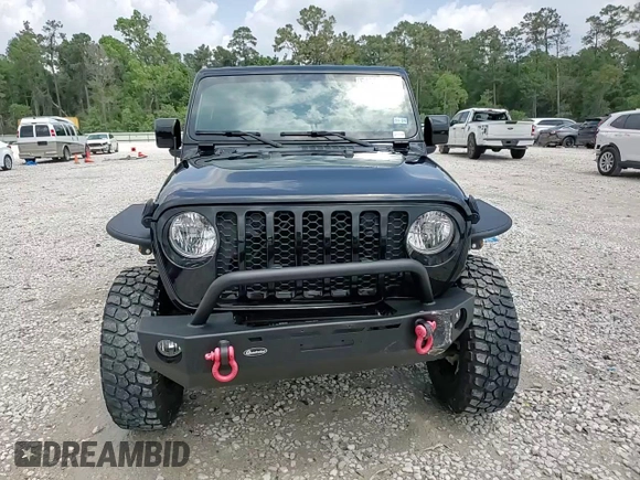 2023 Jeep Gladiator Sport S with VIN 1C6HJTAG9PL525183, listed as a Copart auction lot 54556735 with 13,805 mi miles and Salvage title. Bid and sale history available at DreamBid. Image 13.
