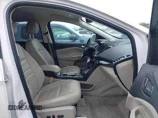 2016 Ford Escape Titanium with VIN 1FMCU9JX4GUB72080, listed as a IAAI auction lot 42519240 with 121,793 mi miles and . Bid and sale history available at DreamBid. Image 5.