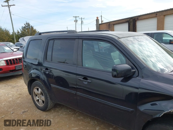 2011 Honda Pilot EX-L with VIN 5FNYF3H69BB043509, listed as a IAAI auction lot 41127719 with 241,167 mi miles and . Bid and sale history available at DreamBid. Image 13.