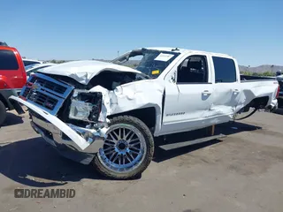 2015 Chevrolet Silverado 1500 LT with VIN 1GCUKREC5FF199331, listed as a IAAI auction lot 42111381 with 180,056 mi miles and . Bid and sale history available at DreamBid. Image 6.
