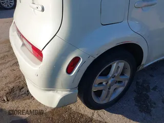 2009 Nissan Cube SL z VIN JN8AZ28R19T106532, wystawiony jako IAAI lot #40675288 z przebiegiem Nie podano mil oraz . Historia ofert i sprzedaży dostępna na DreamBid. Obrazek 12.
