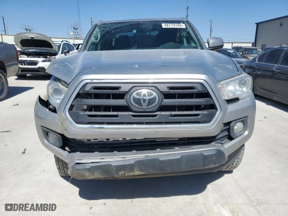 2019 Toyota Tacoma 4WD SR with VIN 5TFCZ5AN4KX199736, listed as a Copart auction lot 48779145 with 52,939 mi miles and Salvage Title. Bid and sale history available at carsss.com. Image 5.