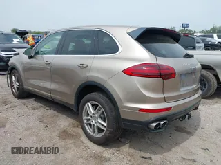 2015 Porsche Cayenne S z VIN WP1AB2A29FLA59662, wystawiony jako IAAI lot #41892021 z przebiegiem 134 687 mil mil oraz . Historia ofert i sprzedaży dostępna na DreamBid. Obrazek 3.