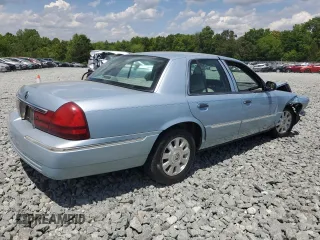 2003 Mercury Grand Marquis LS Premium с VIN 2MEFM75WX3X665058, выставлен на аукционе Copart как лот 55266225 с пробегом 120 904 миль миль и Списание • Salvage title. История ставок и продаж доступна на DreamBid. Изображение 3.