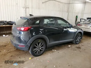 2018 Mazda CX-3 Touring with VIN JM1DKFC70J0316975, listed as a Copart auction lot 48657905 with 76,240 mi miles and Salvage Title. Bid and sale history available at carsss.com. Image 3.