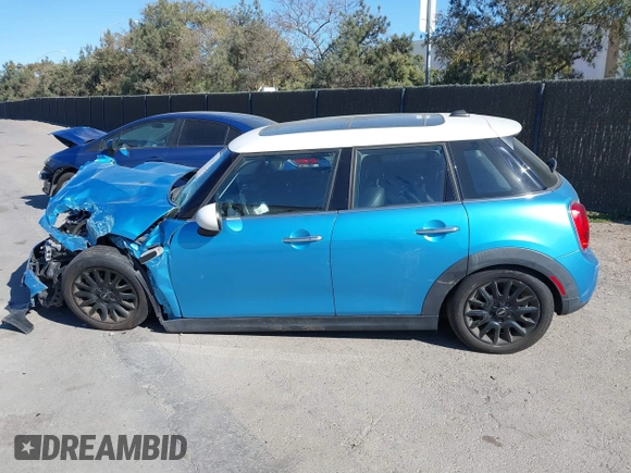 2019 MINI Hardtop 4 Door Cooper with VIN WMWXU1C53K2J02378, listed as a IAAI auction lot 41297292 with 26,594 mi miles and . Bid and sale history available at DreamBid. Image 15.