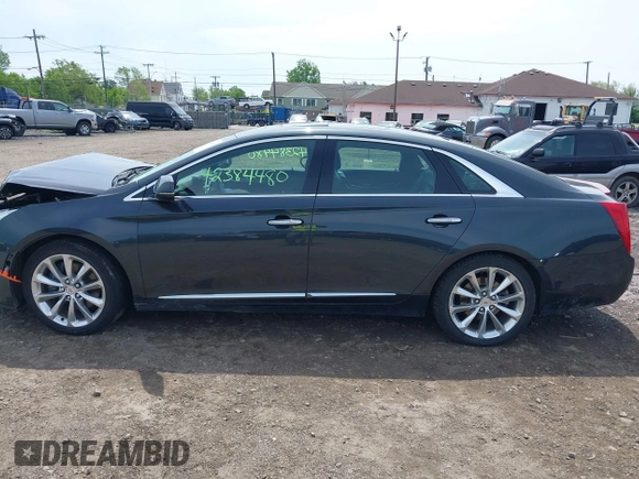 2013 Cadillac XTS Luxury with VIN 2G61P5S3XD9244824, listed as a IAAI auction lot 42384480 with 78,192 mi miles and . Bid and sale history available at DreamBid. Image 14.