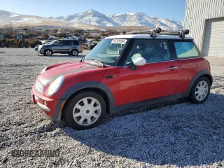 2004 MINI Hardtop with VIN WMWRC33434TC53820, listed as a Copart auction lot 85389994 with 164,452 mi miles and Salvage Title. Bid and sale history available at DreamBid. Image 1.