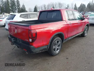 2022 Honda Ridgeline RTL-E with VIN 5FPYK3F74NB011358, listed as a IAAI auction lot 41431157 with 26,116 mi miles and . Bid and sale history available at DreamBid. Image 4.