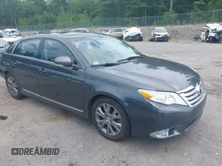 2011 Toyota Avalon with VIN 4T1BK3DBXBU410053, listed as a IAAI auction lot 42645182 with 106,253 mi miles and . Bid and sale history available at DreamBid. Image 1.