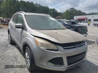 2015 Ford Escape Titanium with VIN 1FMCU0J98FUA87044, listed as a IAAI auction lot 41952096 with 257,437 mi miles. Bid and sale history available at carsss.com. Image 1.