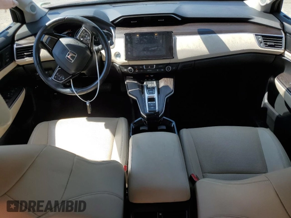 2018 Honda Clarity Touring with VIN JHMZC5F34JC006234, listed as a Copart auction lot 65652714 with 63,704 mi miles and Salvage Title. Bid and sale history available at DreamBid. Image 8.