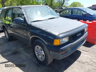 1996 Isuzu Rodeo z VIN 4S2CK58V1T4342739, wystawiony jako IAAI lot #42058798 z przebiegiem 268 502 mil mil oraz . Historia ofert i sprzedaży dostępna na DreamBid. Obrazek 1.
