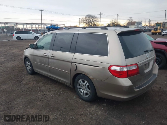 2005 Honda Odyssey EX with VIN 5FNRL38455B115547, listed as a IAAI auction lot 41911371 with 184,150 mi miles. Bid and sale history available at carsss.com. Image 3.