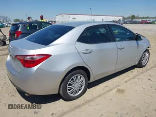 2019 Toyota Corolla L with VIN 2T1BURHEXKC163703, listed as a IAAI auction lot 41870512 with 131,153 mi miles. Bid and sale history available at carsss.com. Image 4.