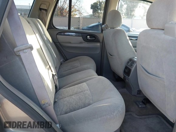 2005 GMC Envoy SLT with VIN 1GKDT13S152373799, listed as a IAAI auction lot 41537512 with 187,750 mi miles. Bid and sale history available at carsss.com. Image 8.