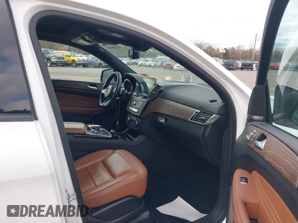 2016 Mercedes-Benz GLE 450 AMG z VIN 4JGED6EB0GA008008, wystawiony jako IAAI lot #42038463 z przebiegiem 159 653 mil mil oraz . Historia ofert i sprzedaży dostępna na DreamBid. Obrazek 5.