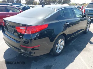 2014 Kia Optima LX with VIN 5XXGM4A74EG291937, listed as a IAAI auction lot 41984281 with 87,378 mi miles. Bid and sale history available at carsss.com. Image 4.