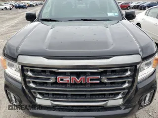 2022 GMC Canyon 4WD AT4 w/Leather with VIN 1GTG6FEN5N1279158, listed as a Copart auction lot 50958545 with 34,569 mi miles and Salvage Title. Bid and sale history available at carsss.com. Image 11.